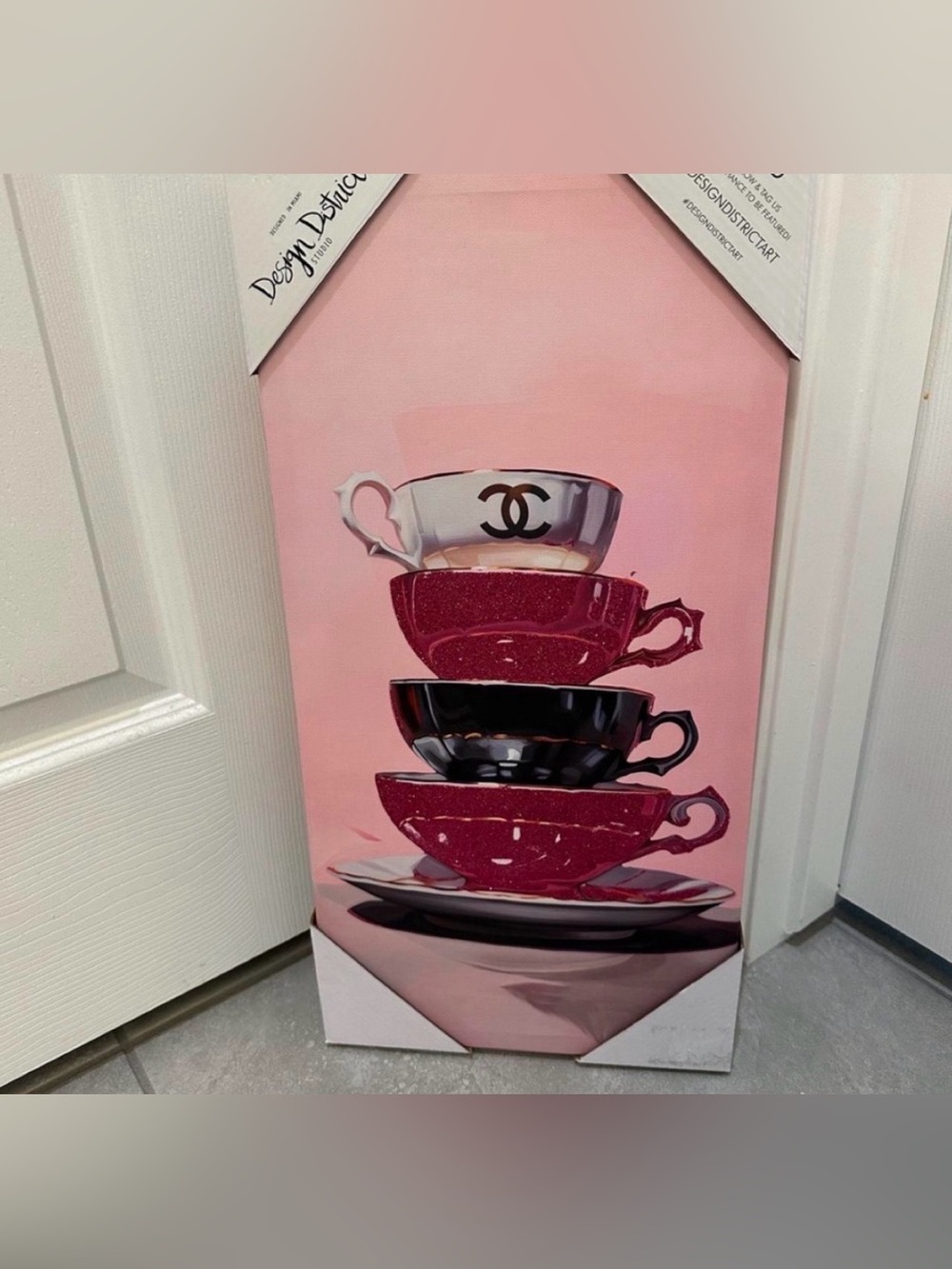 Design District 20x10 wall art with graphic of stacked teacups
